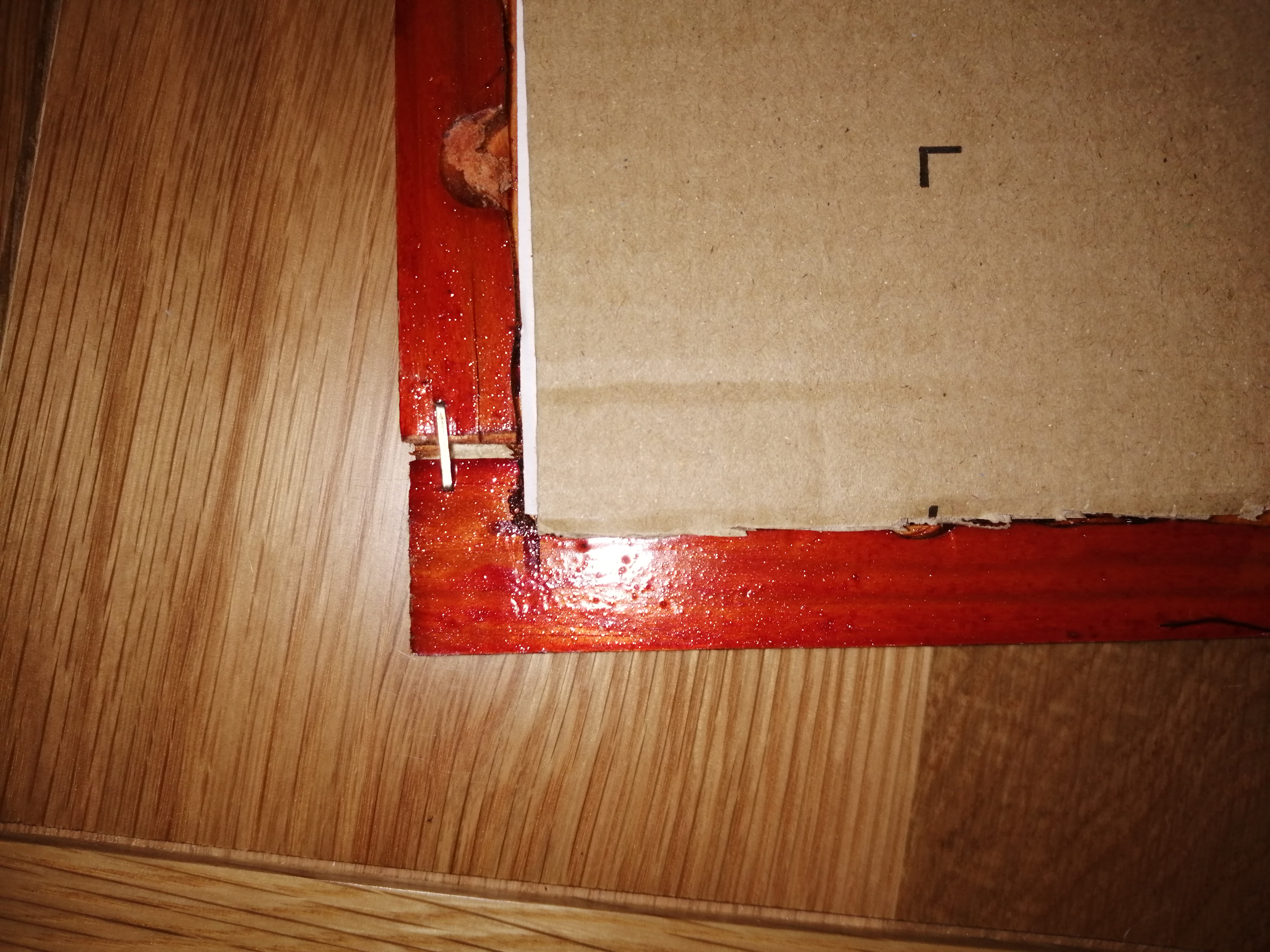 Back view of corner lap mitre joint