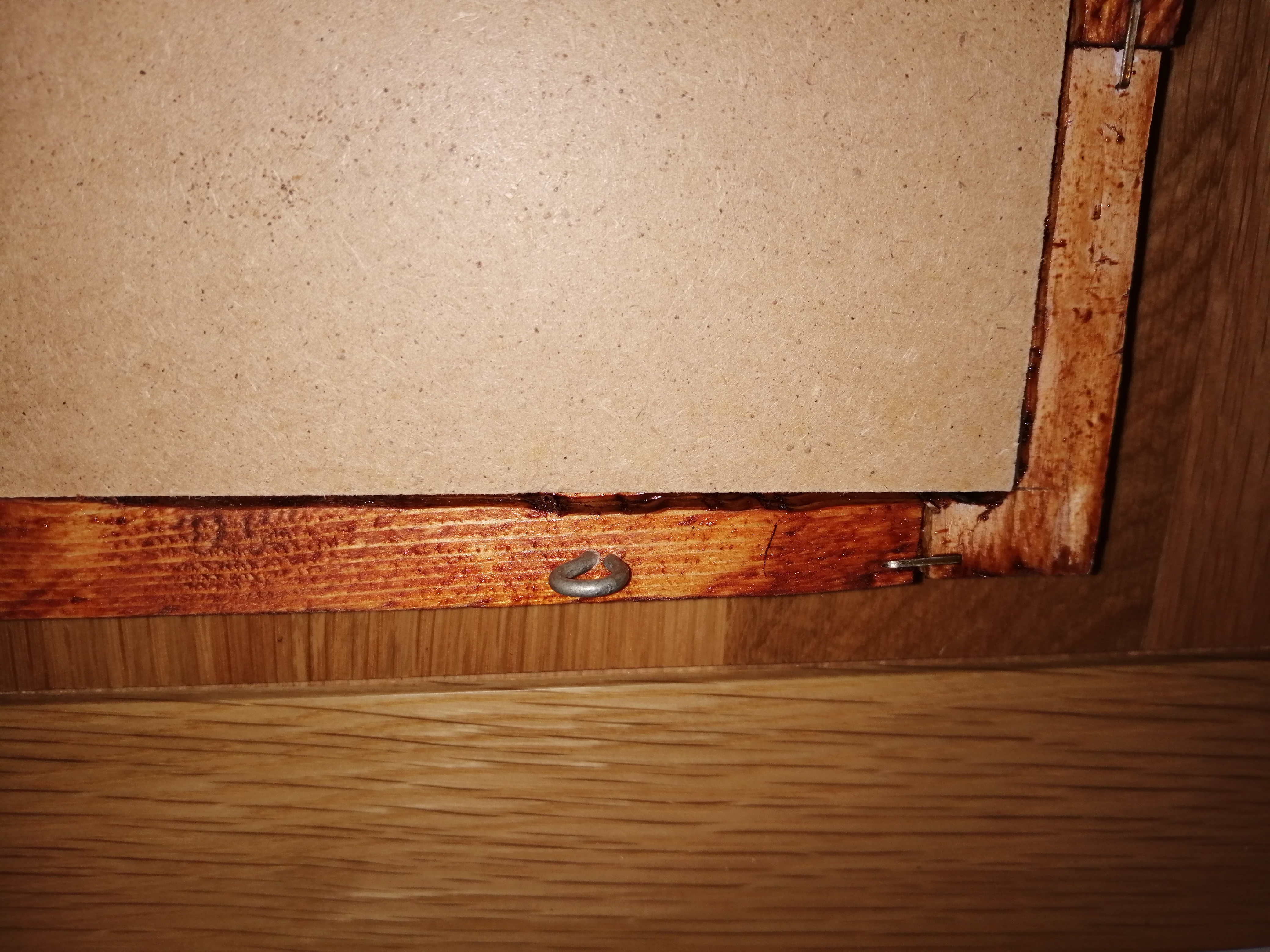 Fixtures for holding frame on wall - loop type for string